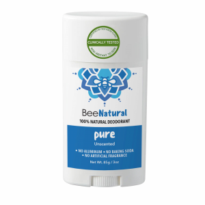 A deodorant stick from the brand "BeeNatural." The deodorant is called "pure" and is labeled as "100% NATURAL DEODORANT." The product features a blue label with the word "Unscented" and states "NO ALUMINUM • NO BAKING SODA • NO ARTIFICIAL FRAGRANCE." The label also says "Non-Irritant To Skin," "Clinically Tested," and "Certified By SGS IDEAS Clinic." The weight is listed as "Net Wt. 85g / 3oz." The packaging is a white twist-up style stick with a white cap.