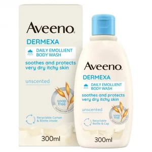 An Aveeno Dermexa Daily Emollient Body Wash product next to its outer packaging box. Both the light-beige cardboard box and the matching bottle feature a light-blue cap, the Aveeno logo, and text stating that the product "soothes and protects very dry itchy skin." The labels also indicate that the body wash is "unscented," "soap free," and contains a 300 ml volume, alongside a small graphic illustration of oat stalks.