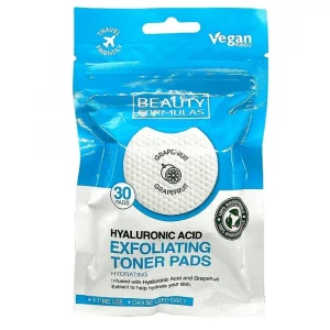 A resealable pouch of Beauty Formulas Hyaluronic Acid Exfoliating Toner Pads against a white background. The packaging is bright blue on top and white on the bottom. The top blue section features a "Travel Friendly" logo with an airplane icon on the left, a "Vegan Friendly" logo on the right, and the brand name "BEAUTY FORMULAS" centered in a white box. A central cutout or graphic shows a textured white round pad with a small grapefruit icon and the words "GRAPEFRUIT GRAPEFRUIT" printed on it. To the left of the pad is a blue circle that reads "30 PADS." The lower white section displays the product name in large bold text: "HYALURONIC ACID EXFOLIATING TONER PADS," followed by the description "HYDRATING - Infused with Hyaluronic Acid and Grapefruit Extract to help hydrate your skin." A circular "100% Biodegradable" logo with green recycling arrows is on the right. A blue banner at the bottom states "1 TIME USE • CAN BE USED DAILY.