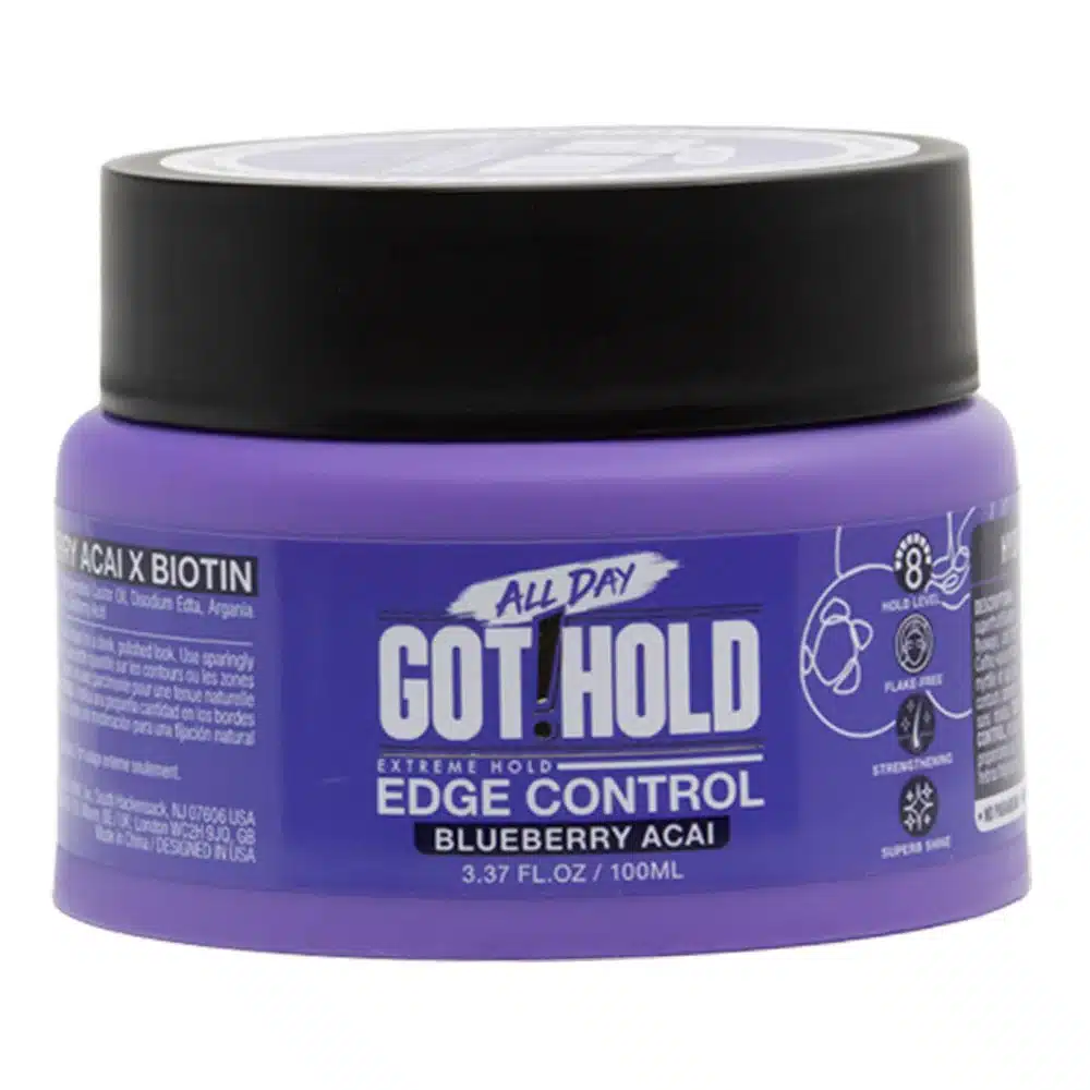 A single jar of All Day Got Hold Extreme Hold Edge Control in the Blueberry Acai formula, shown at a slight angle on a plain white background. The jar is vibrant purple with a black screw-on lid and a blue label. Key text on the label highlights "Blueberry Acai," "2.02 FL. OZ. / 60ML," and features icons for "Hold Level 8," "Flake-Free," "Strengthening," and "Superb Shine.